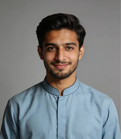 Portrait of Tushar Kant Ram, Founder and CEO — young man with dark hair and beard in a light blue shirt.