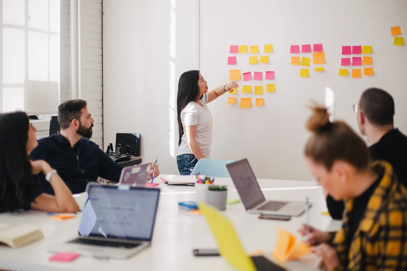 Business team planning digital growth strategy together